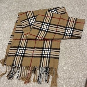 Scarf. 64” long. 12” wide. New. Excellent condition. Unisex.